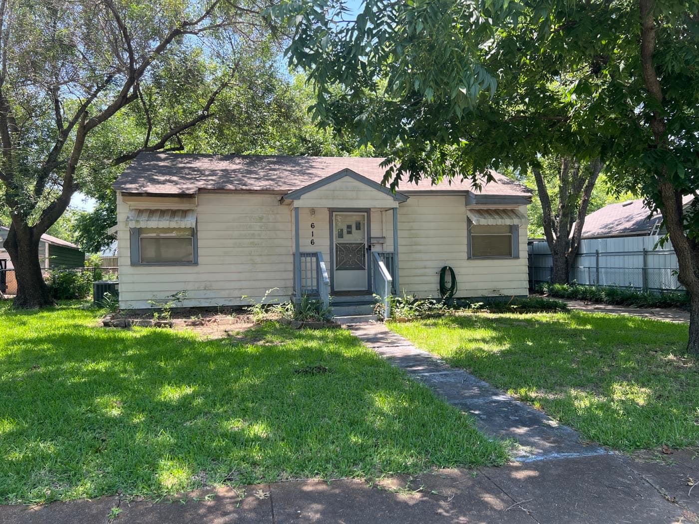 Small dated house in Garland
